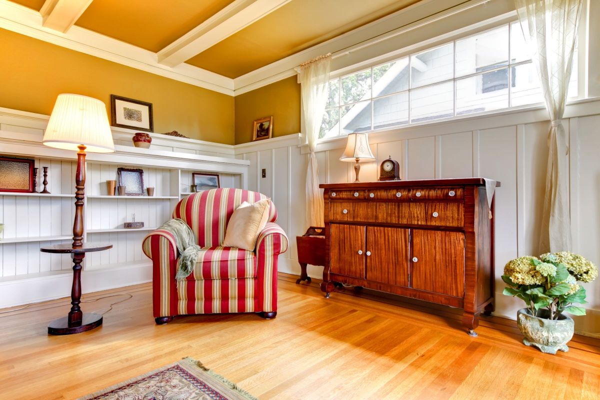 Red Striped Chair and Antique Stained Cabinet 