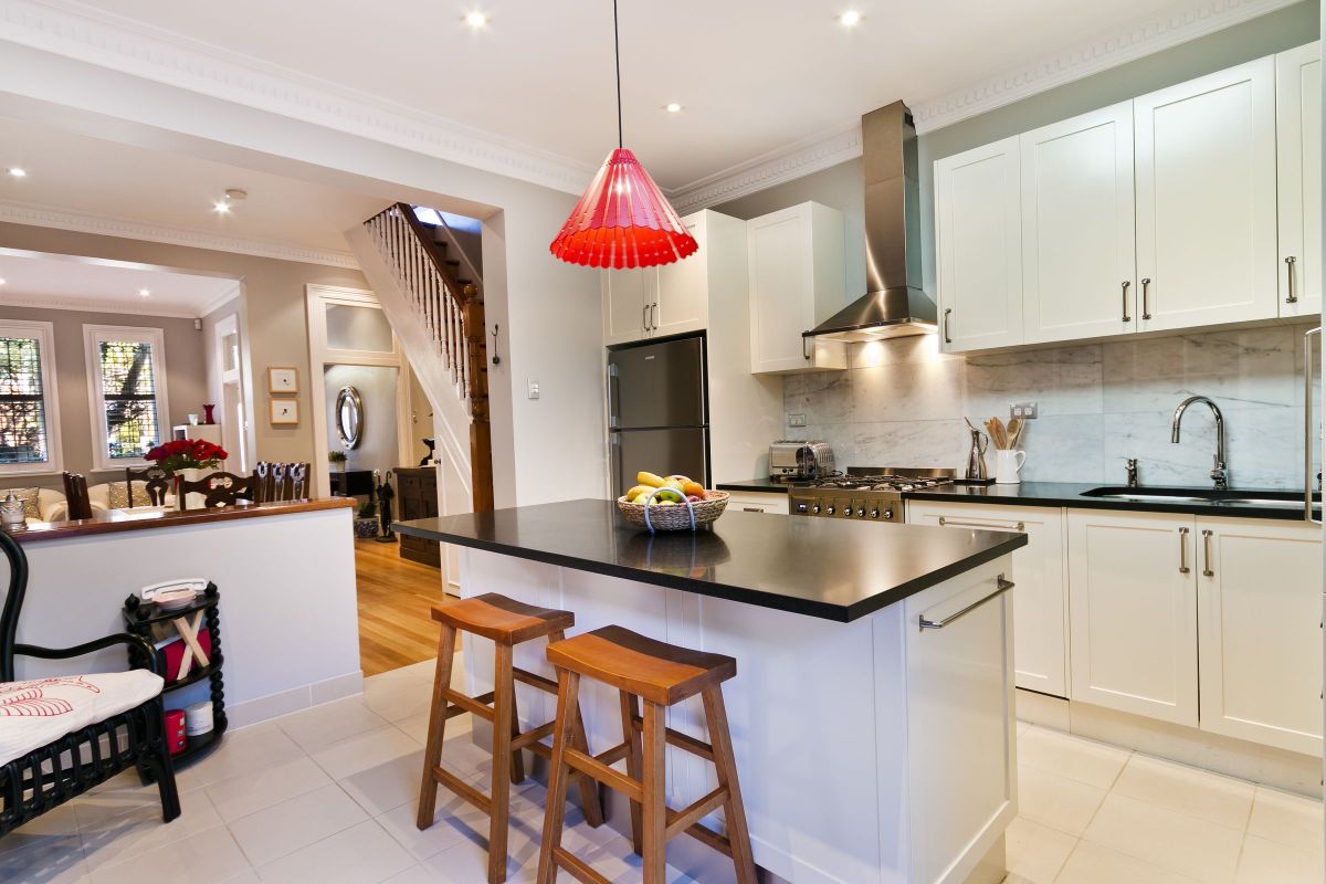 Granite Black Countertops with Bar Stool Seating