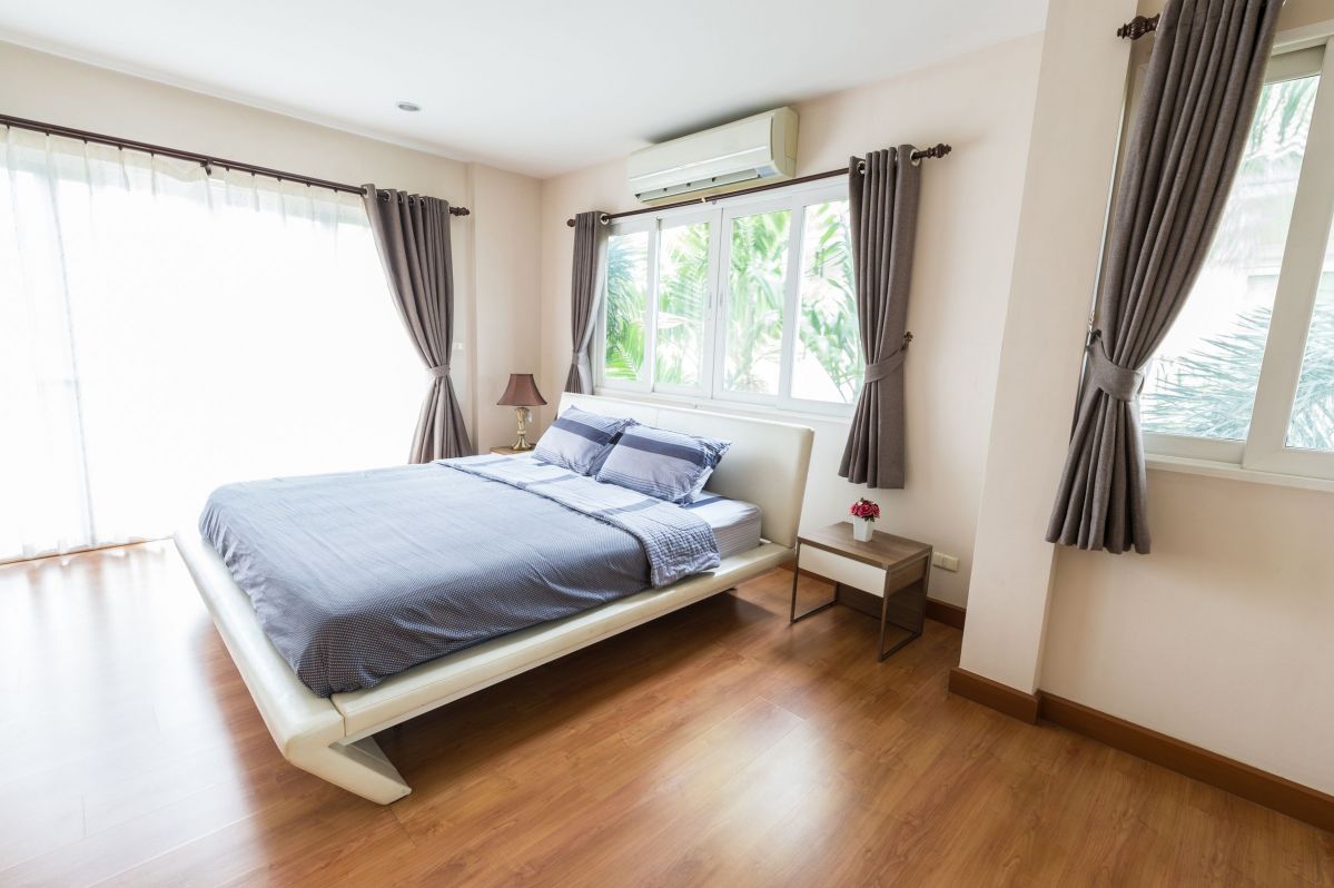 Simplistic, Minimal Bedroom Design for a wide open, Airy Feel