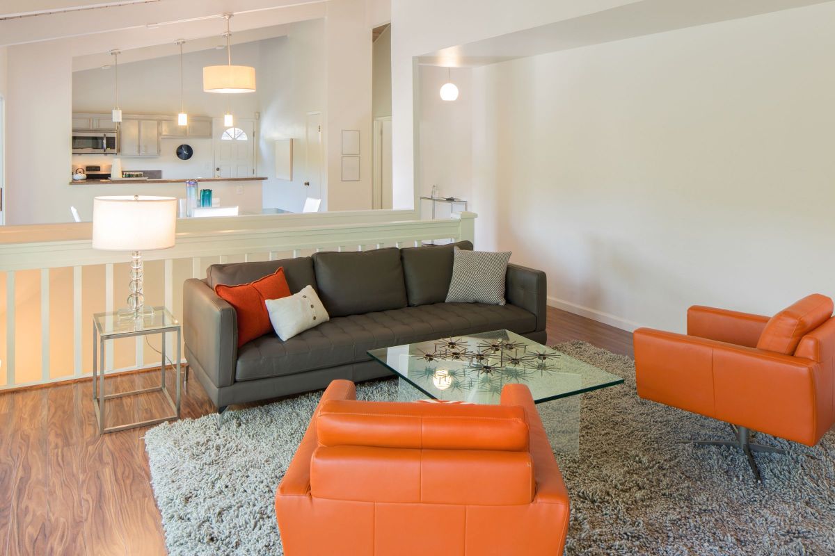 Orange Seating, Off White Walls
