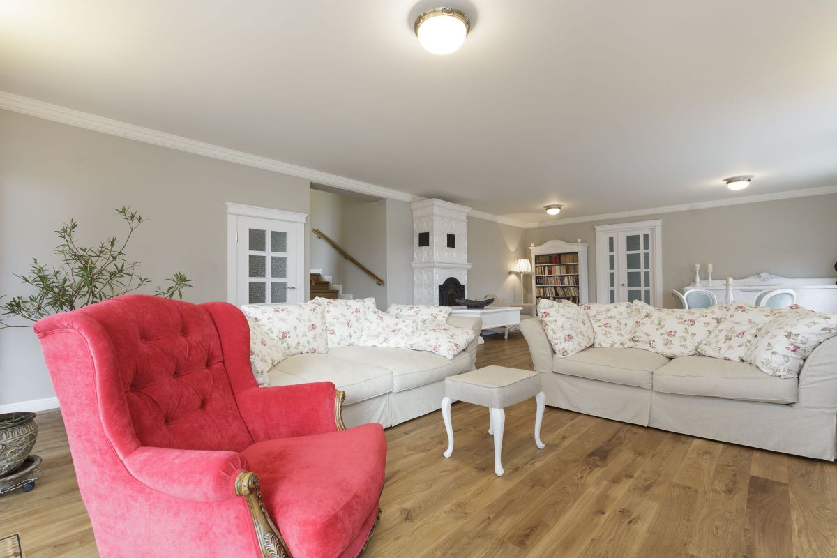 Stunning, Outstanding Pink Chair on a White Contrasting Living Room