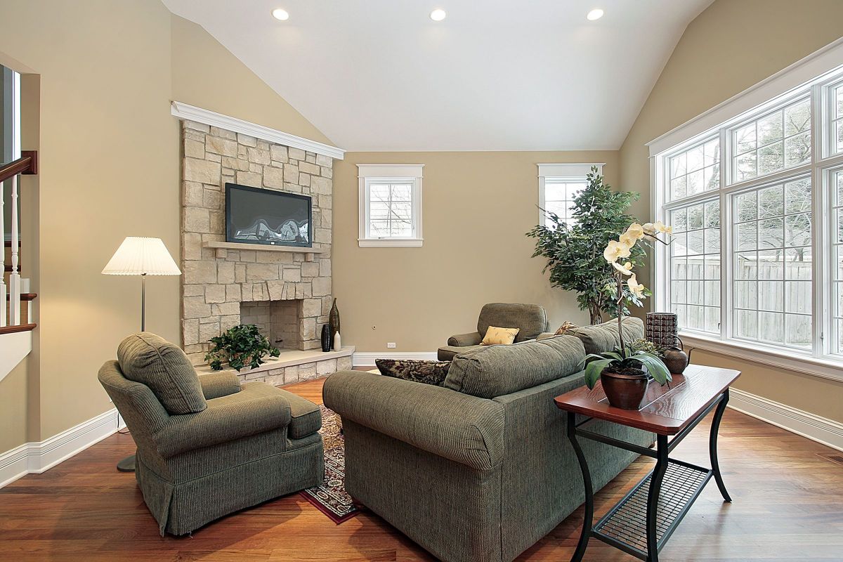 Green Comfy Sofas next to the Living Room Fireplace