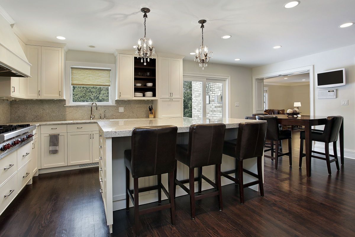 Convenient Kitchen Chair Seating at White Marble Countertops