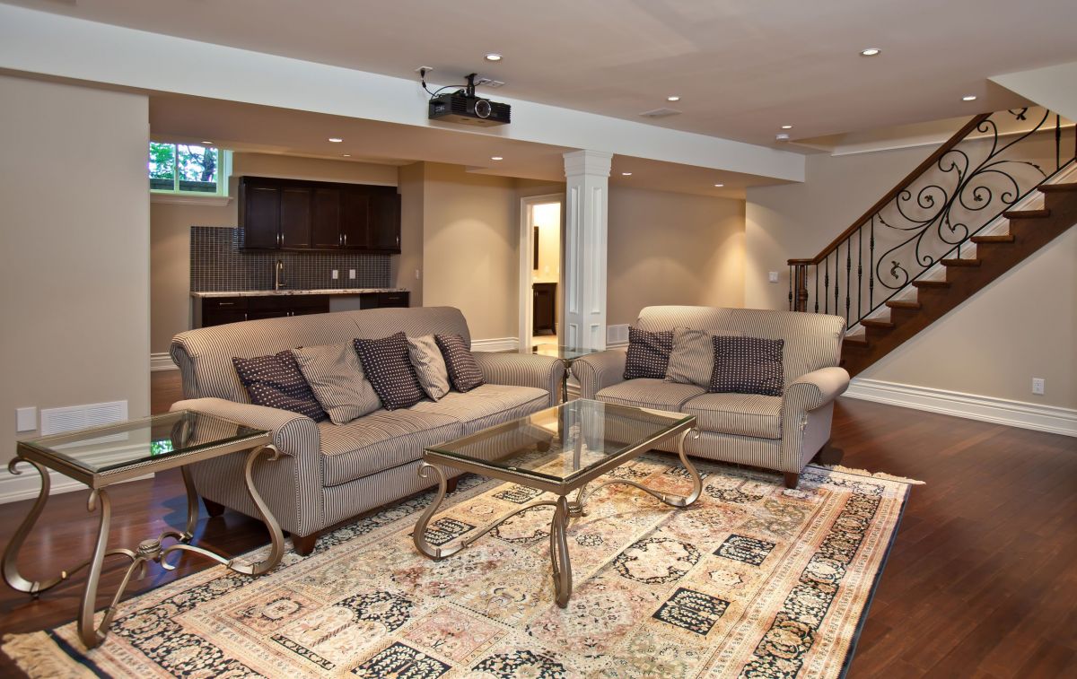 Elegant, Gorgeous Staircase leading into a Relaxed, Comfortable Living Room Set