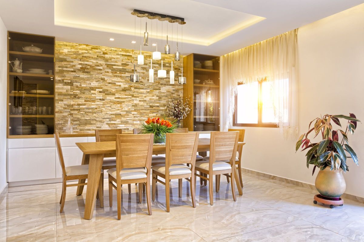 Golden Natural Stone Backdrop in a Dining Room