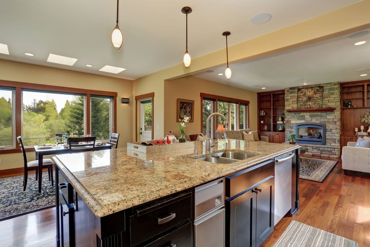 Granite Kitchen Countertops and a Natural Stone Brick Fireplace