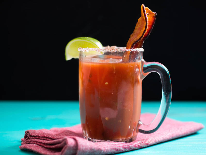 Delish smoky bloody mary on the dining room table