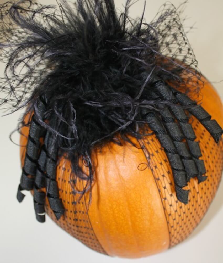 Ribbon accentuates the pumpkin decor this fall season