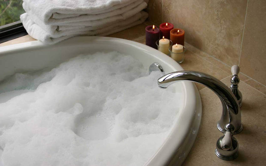 Add some candles around your bathtub to set a more relaxing mood!