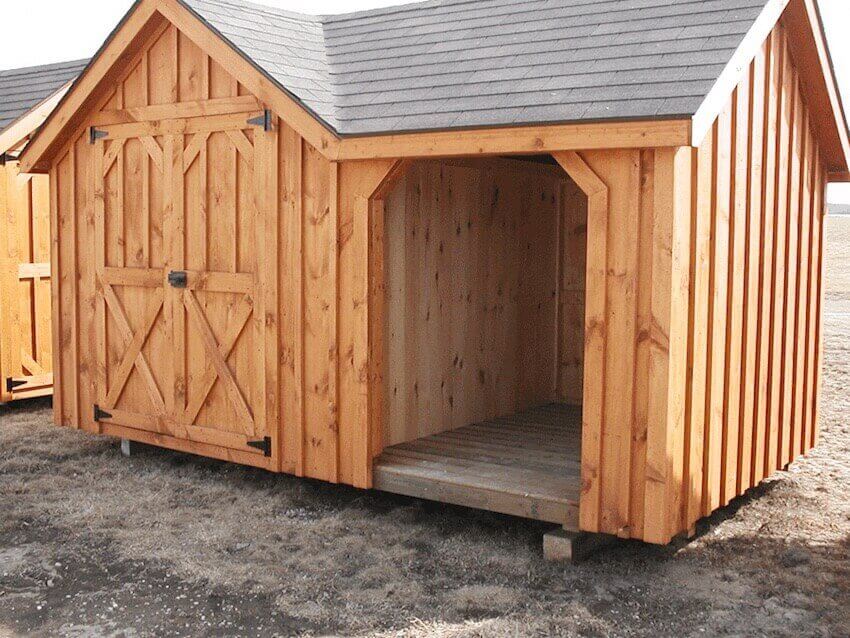 Home exterior siding: This shed matches the style of the house.